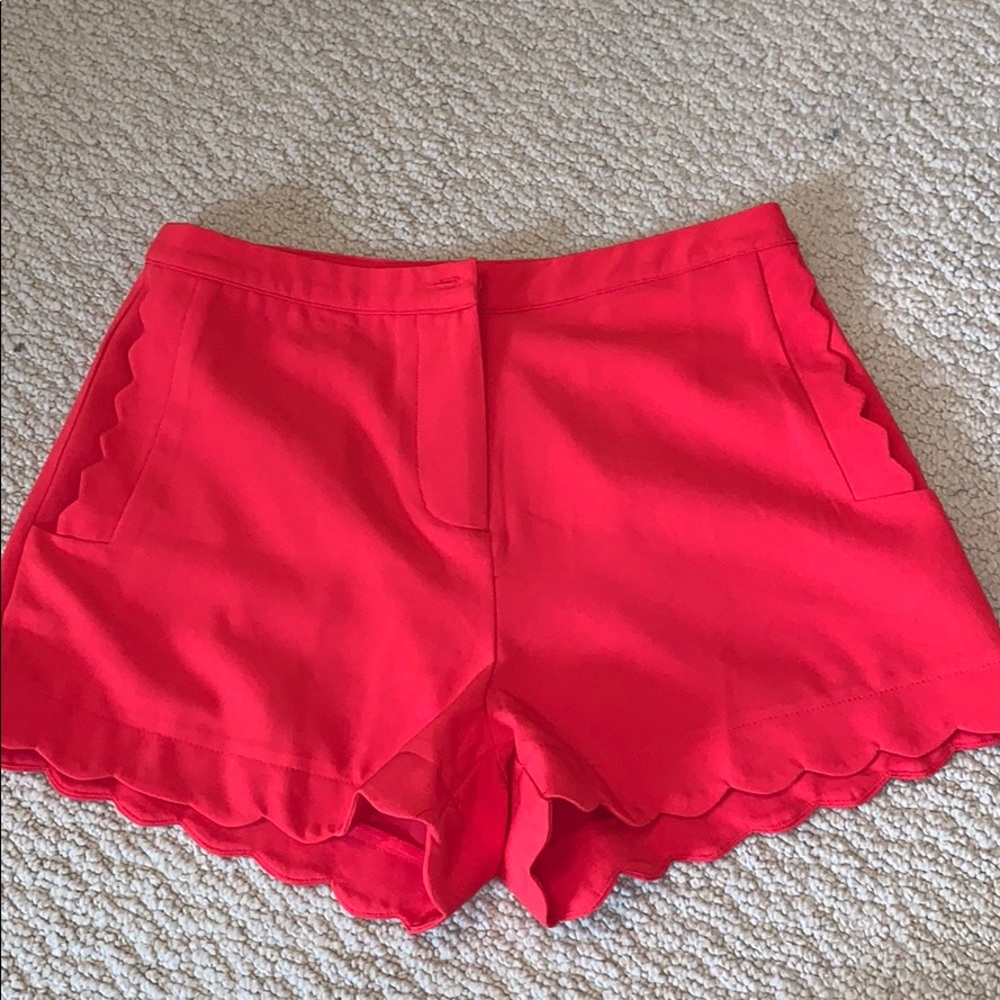 Red scalloped shorts